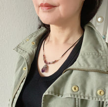 Load image into Gallery viewer, A model is wearing Deep Purple Amethyst Leather Cord Necklace