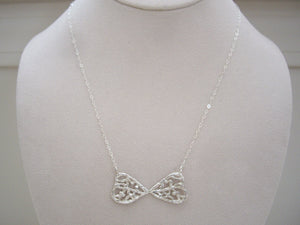Filigree Bow Tie Necklace, on neck