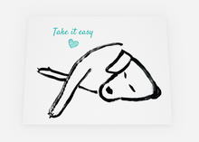 Load image into Gallery viewer, Black and white illustration of a person lying down with 'Take it easy' text and heart symbol on a light gray background.