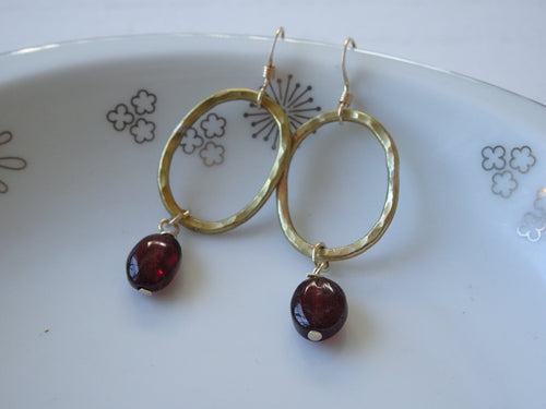 Gold Open Oval Earrings with Garnet