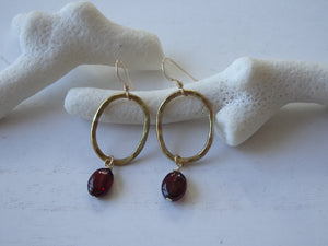 Gold Open Oval Earrings with Garnet