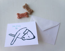 Load image into Gallery viewer, Card with a drawing of a dog and an envelope, accompanied by two dog bones on a light background.