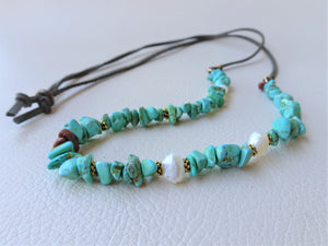 Turquoise blue suede cord necklace