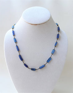 Blue Roman glass Necklace on neck 