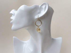 Citrine gold earrings on mannequin