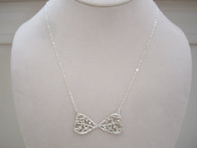 Load image into Gallery viewer, Filigree Bow Tie Necklace, on neck